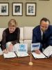 High Commissioner on National Minorities Kairat Abdrakhmanov and Assistant High Commissioner for Protection at the United Nations High Commissioner for Refugees Gillian Triggs sign landmark agreement, Geneva, 23 June.  (UNHCR)