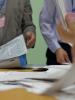 Ballots are sorted at a polling station in Erdenet, Bulgan aimag, for the 26 June 2013 presidential election in Mongolia.  (OSCE/Agnieszka Rembowska)