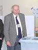 OSCE PA President Bruce George (centre) visiting a polling station during the Kosovo Assembly election in 2001. (OSCE)