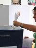 A woman casts her ballot at a polling station in Sarajevo during the 1 October 2006 general elections in Bosnia and Herzegovina. (OSCE/Urdur Gunnarsdottir)