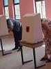 Albanian citizens marking ballots during the parliamentary 
elections, 24 June 2001. (Jens Eschenbaecher/OSCE)